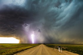 Lightning spreads out under a Colorado afternoon storm